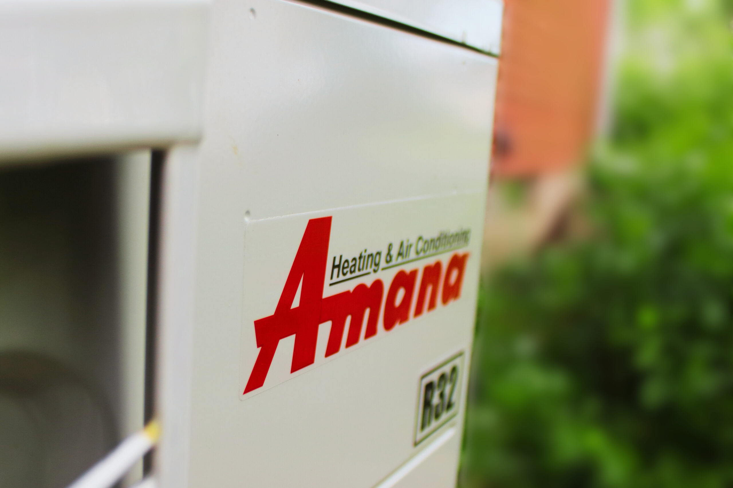 Amana outdoor AC unit installed by Sub-Cooled with proper clearance